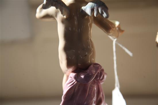 Two Meissen figures of Cupid, circa 1900, 20 cm and 21cm